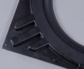 Textured to reduce sticking of green tires.